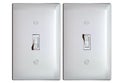 Electric light switch in ON and OFF positions Royalty Free Stock Photo
