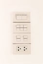 Electric light switches in of position and sockets Royalty Free Stock Photo