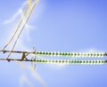 Electric line against the blue sky Royalty Free Stock Photo