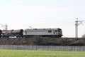 Electric locomotive with freight train on WCML