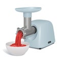 Electric meat grinder with a tray for meat and a metal pipe twists meat for cutlets, a plate with ready forcemeat nearby