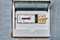 Electric meter is mounted at main electrical panel Royalty Free Stock Photo