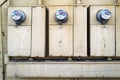 Electric meters on the exterior wall of a building in Grants Pass, Oregon, USA - October 30, 2022