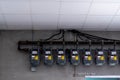 Electric meters grouped together on a concrete wall Royalty Free Stock Photo