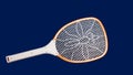 Electric mosquito swatter that cuts out the background, making a blue Royalty Free Stock Photo