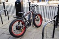 Electric Mountain Bike with fat tyres locked to a stand in Chester Royalty Free Stock Photo