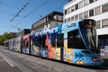 Electric tram with overhead lines of the public transport company in Basel