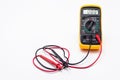 Electric multimeter with red and black probe, display indicating zero. Isolated on a white background with a clipping path. Royalty Free Stock Photo