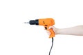 Electric orange drill in caucasian woman hand. White isolate Royalty Free Stock Photo