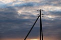 electric pole on the background of sunset in spring Royalty Free Stock Photo