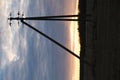 electric pole on the background of sunset in spring Royalty Free Stock Photo