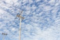 Electric pole on blue sjy day