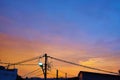 Electric pole at dusk with beautiful sunset Royalty Free Stock Photo