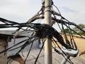 an electric pole full of wire connections