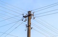 Electric pole power lines and wires with blue sky Royalty Free Stock Photo