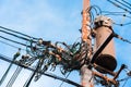 Electric pole with wires against the blue sky, Kyoto, Japan. Copy space for text. Royalty Free Stock Photo