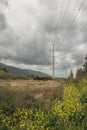 electric pole with wires against a dramatic sky Royalty Free Stock Photo