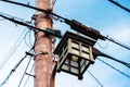 Electric pole with wires against the sky, Kyoto, Japan. Street japanese lantern. Close-up. Royalty Free Stock Photo