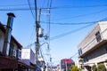 Electric pole with wires and lamp outdoor in the streets organized wiring is neat at bright sky background. Royalty Free Stock Photo