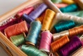 Thread Spools Colorful sewing threads in a wooden craft box. AI Generated Royalty Free Stock Photo