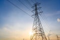 Electric poles and lines at dusk or high voltage towers at beautiful sky Royalty Free Stock Photo