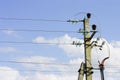 Electric poles with wires on the sky Royalty Free Stock Photo