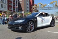 Electric police car Tesla during the 117th Golden Dragon Parade