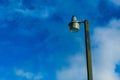 Electric post and blue sky