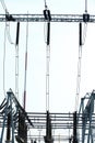 Electric power equipment, high pressure ceramic and metal stents, power grid and power lines Royalty Free Stock Photo