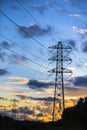 Electric power lines at sunset Royalty Free Stock Photo