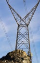 Electric power lines on V shaped metal tower