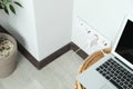 Electric power outlet sockets with charger on white wall Royalty Free Stock Photo