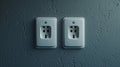 Electric power sockets on grey wall indoors