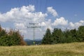 Electric power transmission line of advance summer Royalty Free Stock Photo