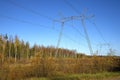 Electric power transmission line (transmission line) in the autumn landscape Royalty Free Stock Photo
