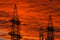 Electric power transmission lines at sunset. Royalty Free Stock Photo