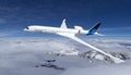 electric powered commercial Aeroplane flying in the sky - future electro energy aviation concept