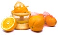 Electric press juicer with cut orange isolated white background. Manual juice extractor. Juicing oranges