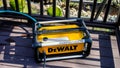 Electric pressure washer from Dewalt outside on wooden deck Royalty Free Stock Photo