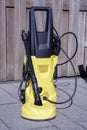 Electric Pressure Washer in the Garden Cleaning Outdoor Tiles