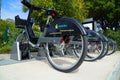 Electric public hire bicycles in racks