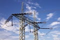 Electric pylons with blue sky Royalty Free Stock Photo