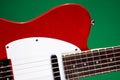 Electric Red Guitar On Green Royalty Free Stock Photo