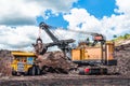 Electric rope shovels loading of coal, ore on the dump truck. Th