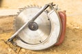 Electric saw with sawdust background in workplace Royalty Free Stock Photo