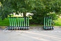 Electric scooters station in European city. Electric transport rent. Electric scooters parked at the street. Urban