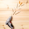 Electric screwdriver and various screws. Set of hand tools on wooden table. Instruments on wooden background. Repair tools Royalty Free Stock Photo