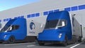 Electric semi-trailer trucks with Danone logo being loaded or unloaded at warehouse. Logistics related 3D rendering