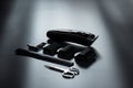 Electric shaving trimmer kit. Shaving machine on black. Barber tools on black with light on it Royalty Free Stock Photo