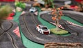 Electric slot cars on toy race track Royalty Free Stock Photo